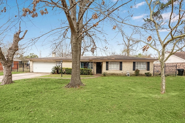 single story home with a garage and a front yard