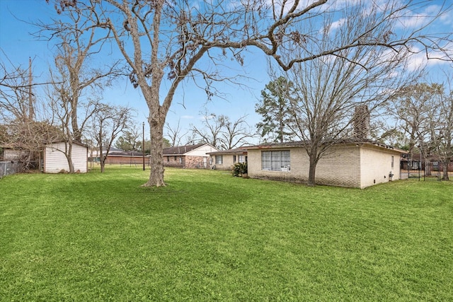 view of yard with a shed