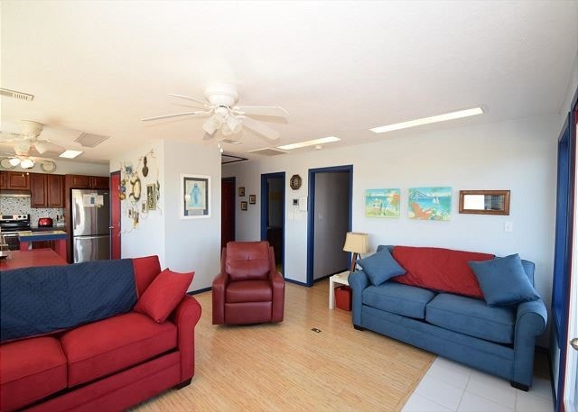 living room with ceiling fan