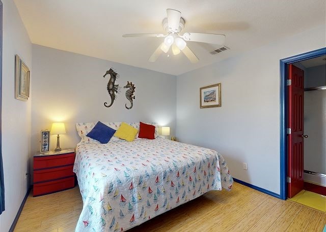 bedroom featuring ceiling fan and light wood-type flooring