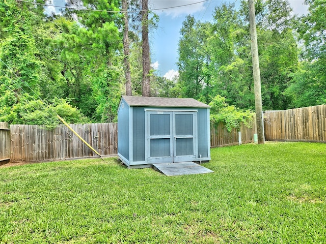 view of outbuilding with a lawn