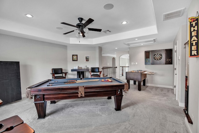 game room featuring a raised ceiling, ceiling fan, light carpet, and pool table