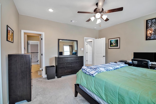 carpeted bedroom featuring ceiling fan