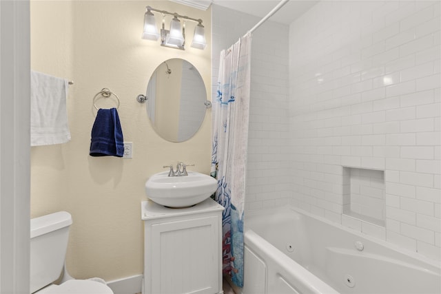 full bathroom with vanity, shower / bath combination with curtain, and toilet