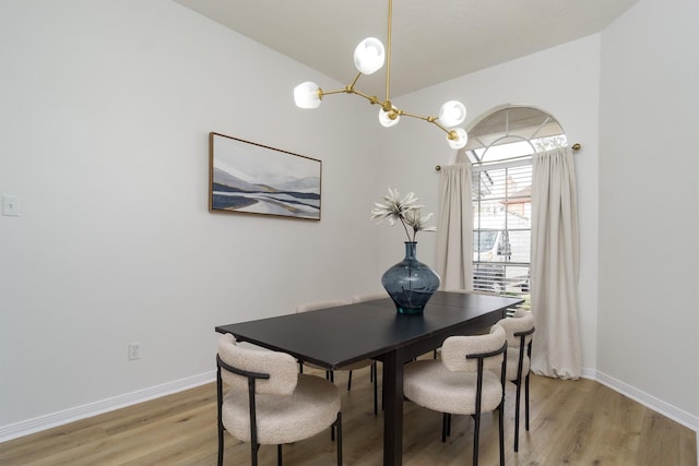 dining space featuring light hardwood / wood-style floors