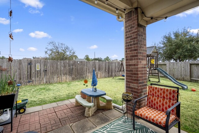 19106 High Canyon Ln, Tomball, TX 77377 - view of patio with a playground