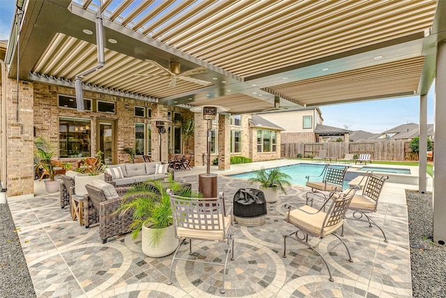 view of patio / terrace featuring an outdoor living space, a pergola, and a fenced in pool