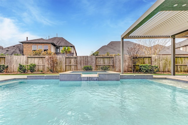 view of pool with an in ground hot tub