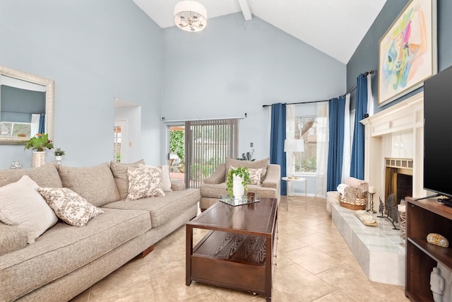 living room with light tile patterned floors, beam ceiling, a fireplace, and high vaulted ceiling