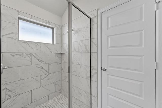 bathroom featuring an enclosed shower