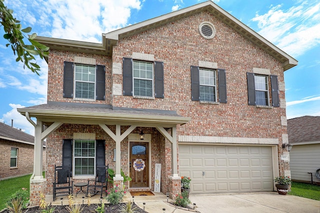 front facade with a garage and covered porch