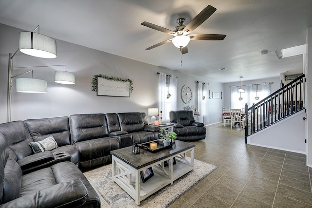 living room featuring ceiling fan