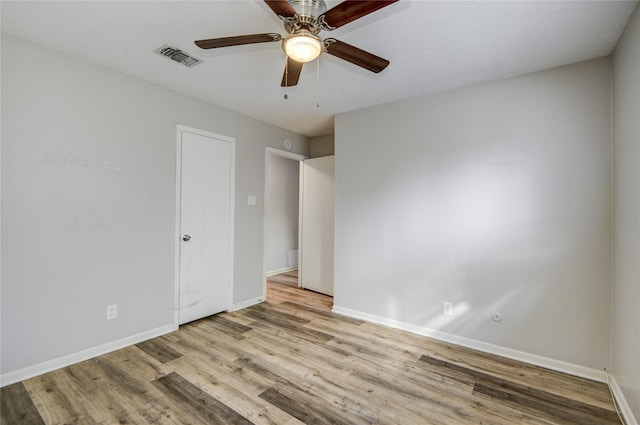 unfurnished bedroom featuring ceiling fan and light hardwood / wood-style flooring