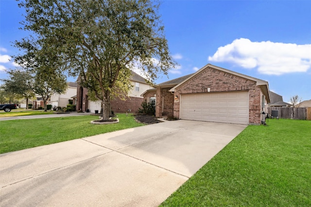 view of front of property featuring a front yard, central AC unit, and a garage