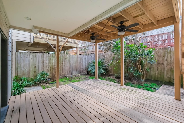 wooden deck with ceiling fan