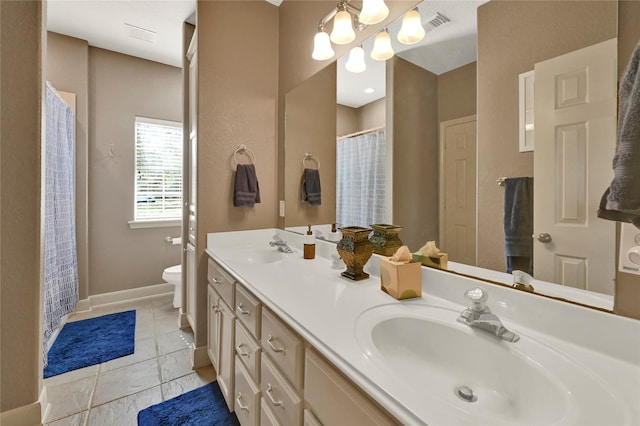 bathroom featuring vanity, a shower with curtain, and toilet