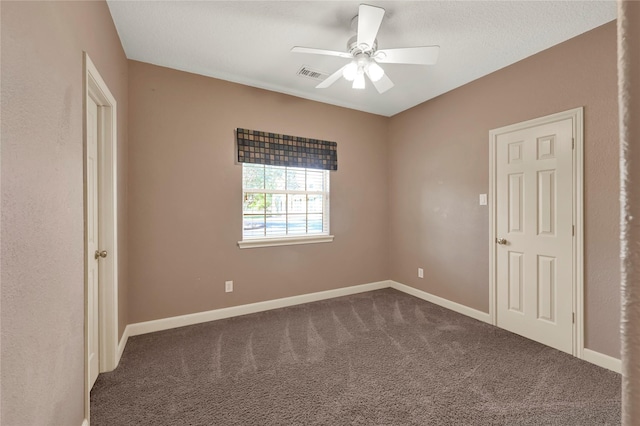 unfurnished bedroom with carpet floors and ceiling fan