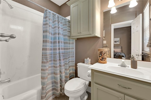 full bathroom featuring shower / bath combo, vanity, and toilet