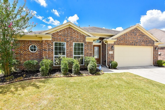 view of front of home with a garage and a front lawn