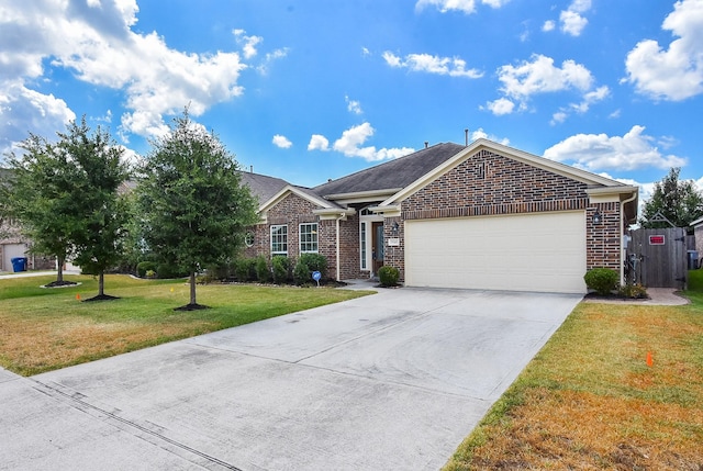 ranch-style home with a garage and a front yard