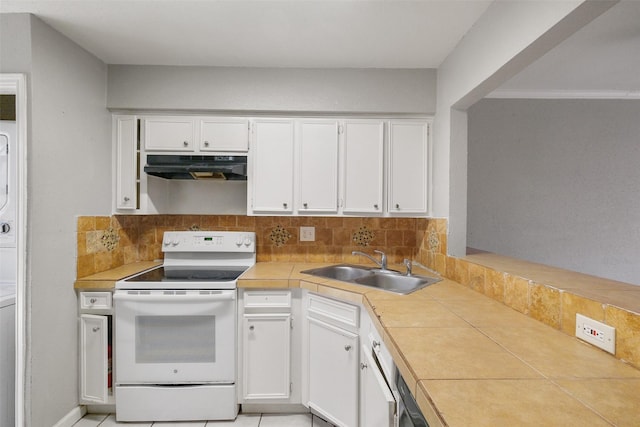 kitchen with white cabinetry, decorative backsplash, and white range with electric stovetop