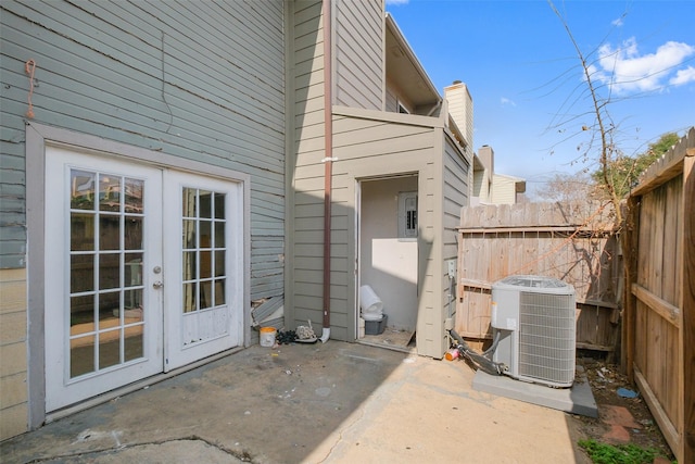 exterior space featuring central AC and french doors