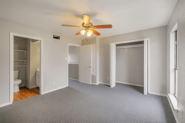 unfurnished bedroom featuring ceiling fan, carpet flooring, and a closet