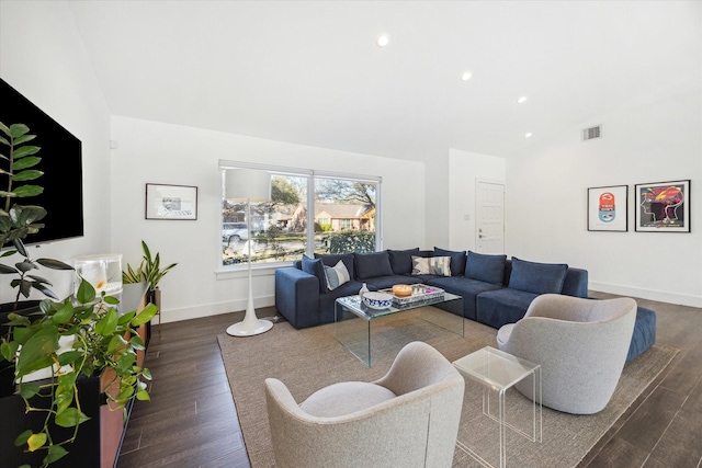 living room with dark hardwood / wood-style flooring