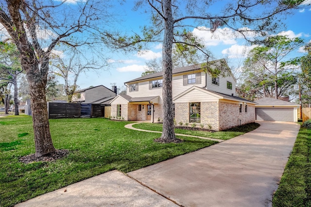 view of front of home with a garage and a front yard