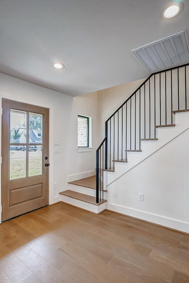 foyer entrance featuring light hardwood / wood-style flooring