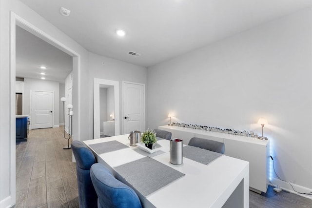 dining room featuring hardwood / wood-style floors