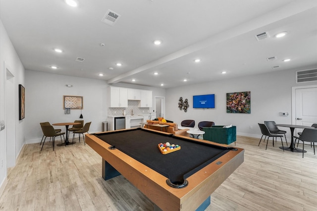 recreation room with light hardwood / wood-style floors and billiards