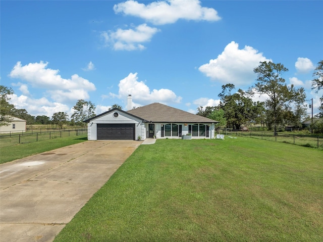 view of front facade featuring a garage and a front lawn