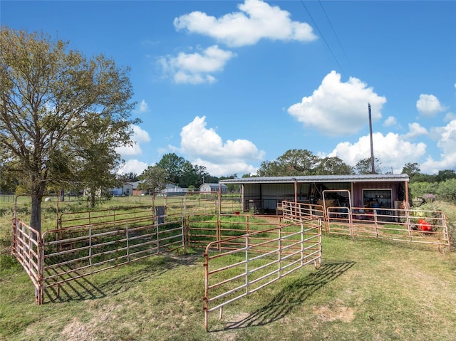 view of stable featuring a rural view