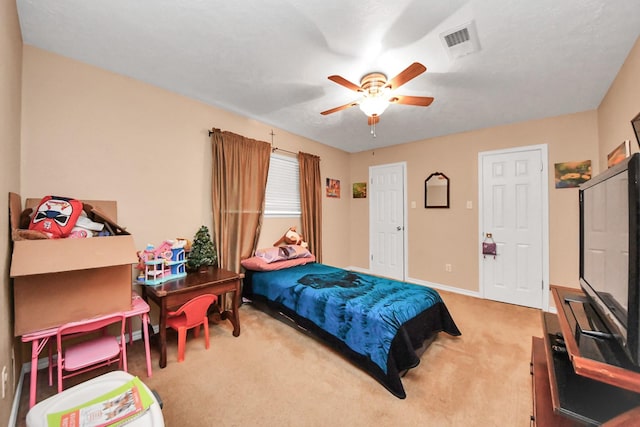 bedroom featuring carpet floors and ceiling fan