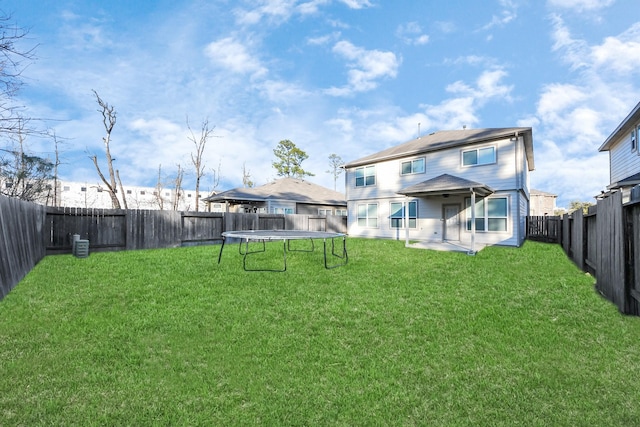 exterior space featuring a patio and a trampoline