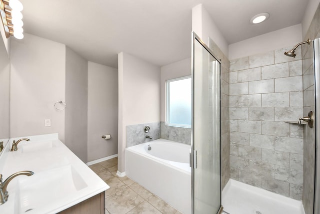 bathroom featuring vanity and separate shower and tub