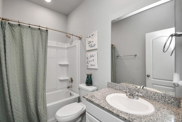 full bathroom featuring vanity, shower / tub combo with curtain, and toilet