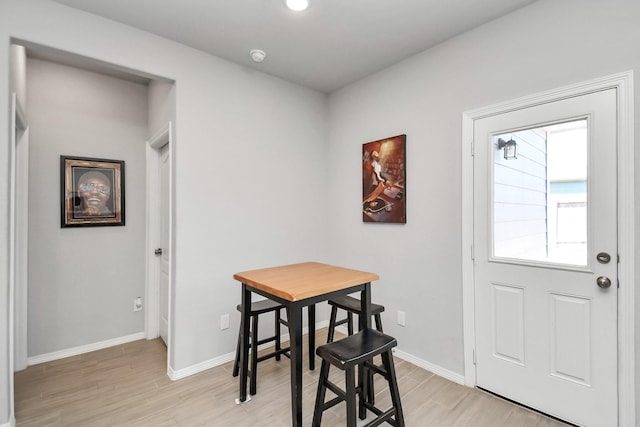 dining room with light hardwood / wood-style floors