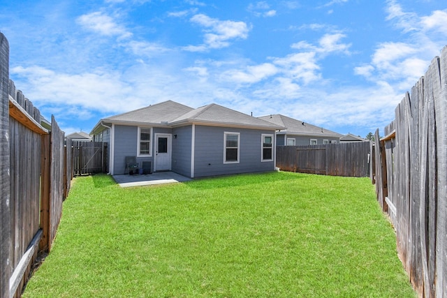 back of house with cooling unit, a patio area, and a lawn