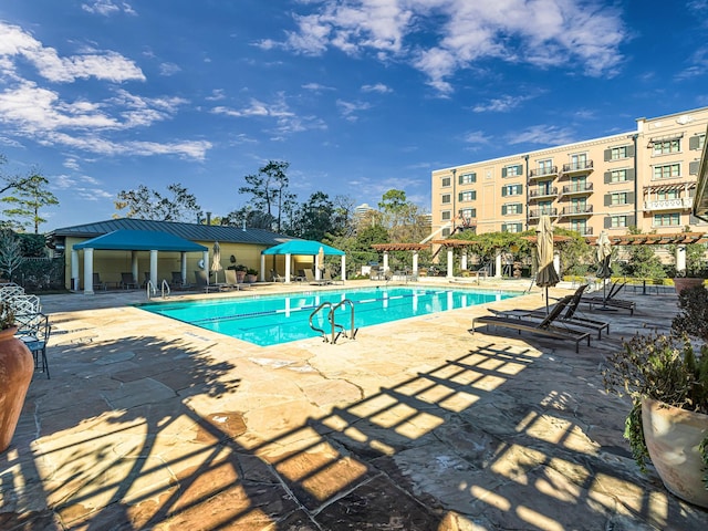 view of pool with a gazebo, a pergola, and a patio