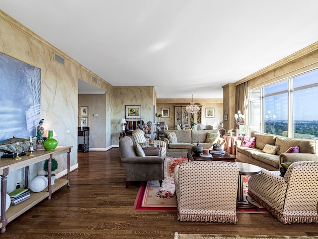 living room featuring a notable chandelier and dark wood-type flooring