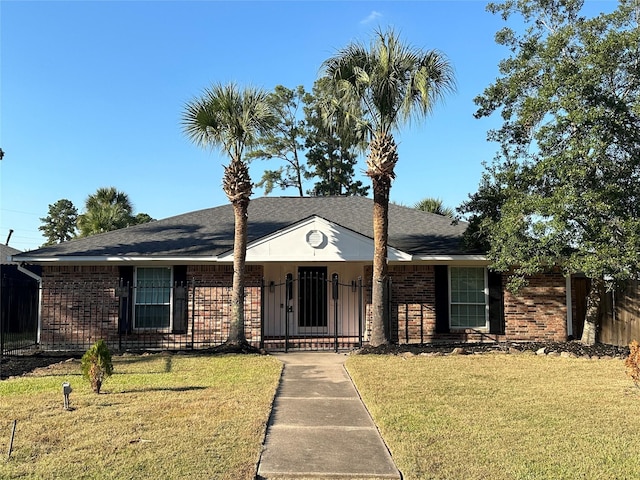 ranch-style house with a front yard