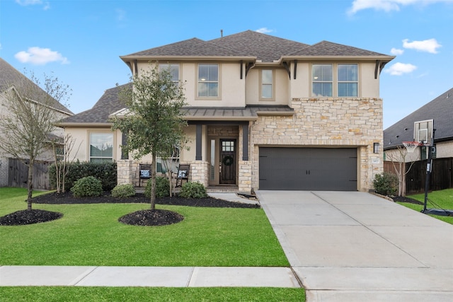 view of front facade with a garage and a front yard