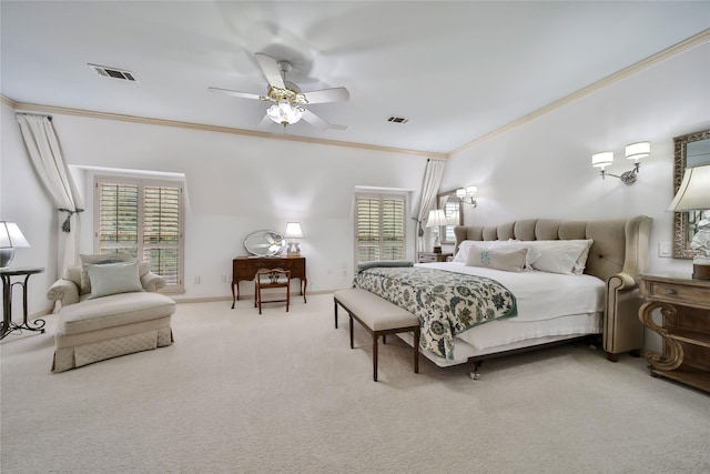 carpeted bedroom with baseboards, ceiling fan, visible vents, and crown molding