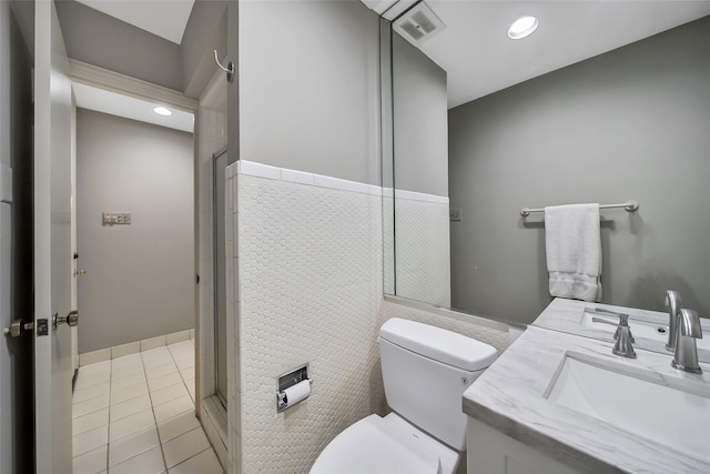 full bathroom with recessed lighting, visible vents, toilet, vanity, and tile patterned flooring