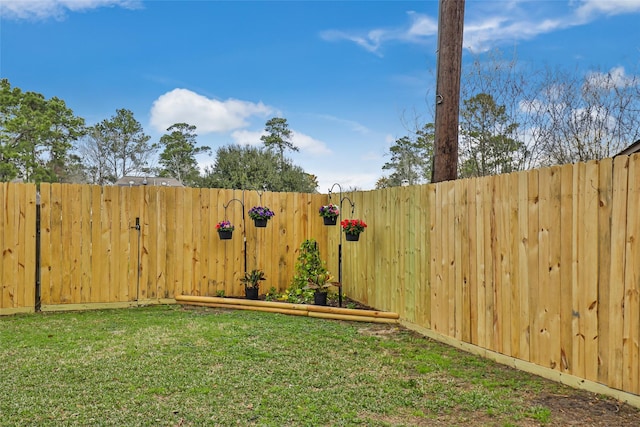 view of yard with fence