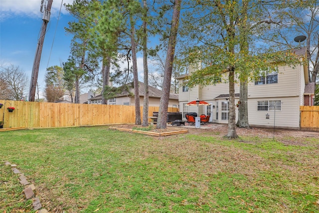 view of yard with a fenced backyard