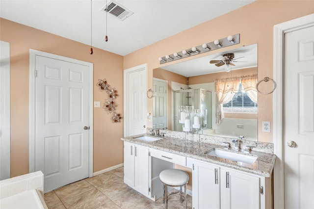 bathroom featuring a sink, visible vents, ceiling fan, and double vanity