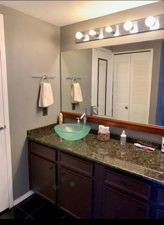 bathroom featuring vanity and tile patterned floors